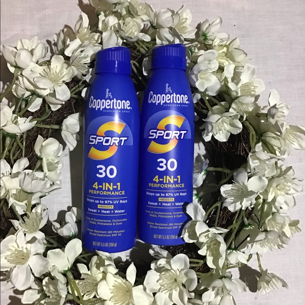 Two brand new spray bottles of Coppertone sport 30 sunscreen